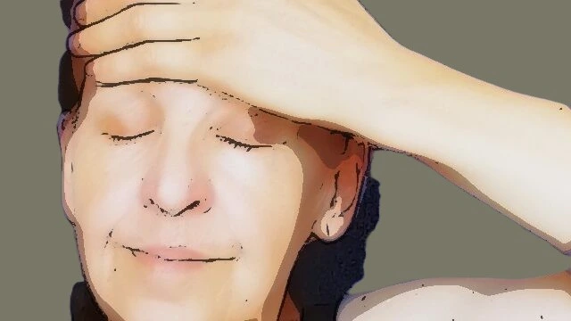 Face Massage: Woman Massages Her Forehead Area